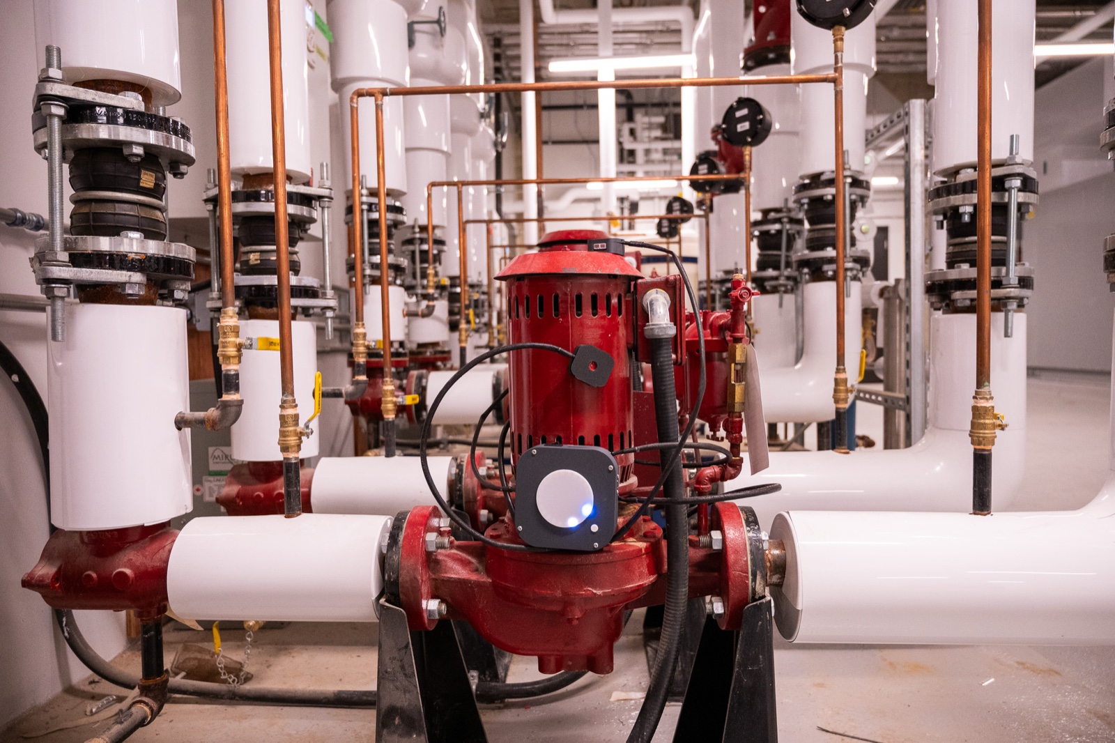 Halix monitoring node deployed on a circulating pump in an industrial mechanical room
