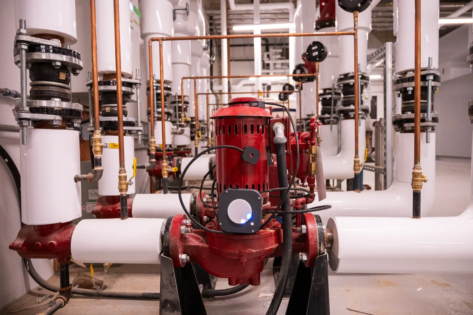 Halix monitoring node deployed on a circulating pump in an industrial mechanical room
